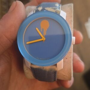 Movado Blue Dial Watch with Yellow Hands and Icon